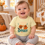 Infant wearing the Loud & Spooky T-shirt in Butter