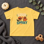 Loud & Spooky toddler T-shirt in Butter, styled Halloween flatlay