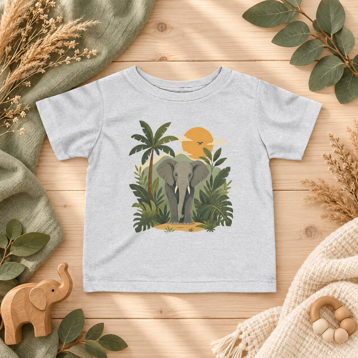Safari Elephant Jungle Sunset infant T-shirt in Heather, earthy botanical flatlay